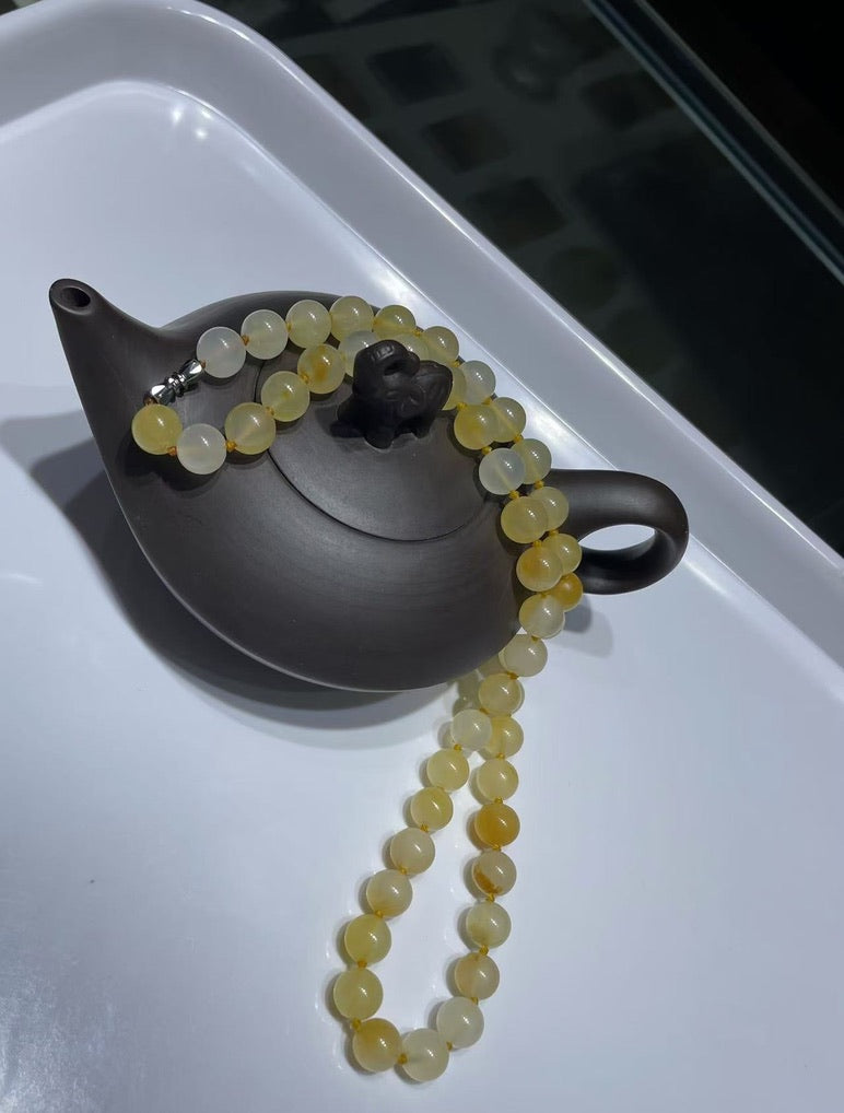 Golden yellow and icy translucent jade necklace
