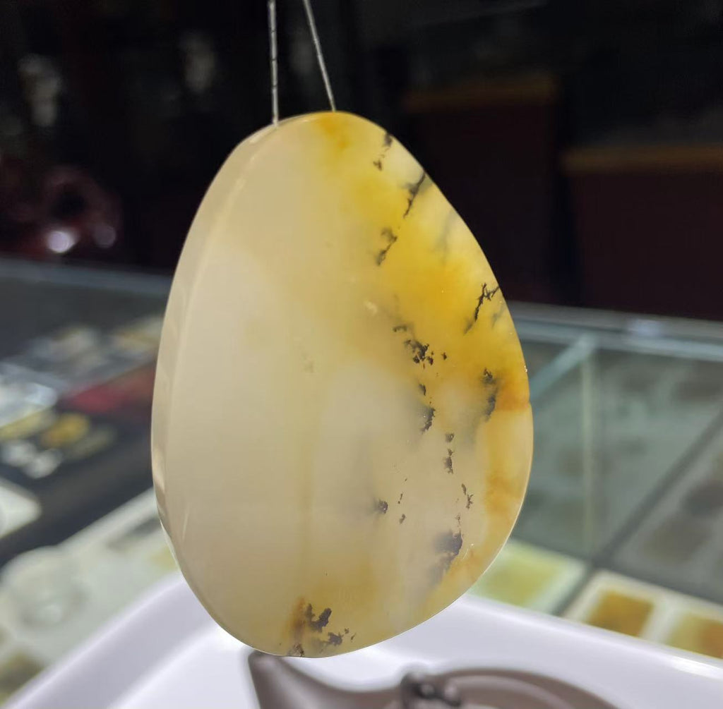 Yellow jade pendant (Ancient seabed gross)