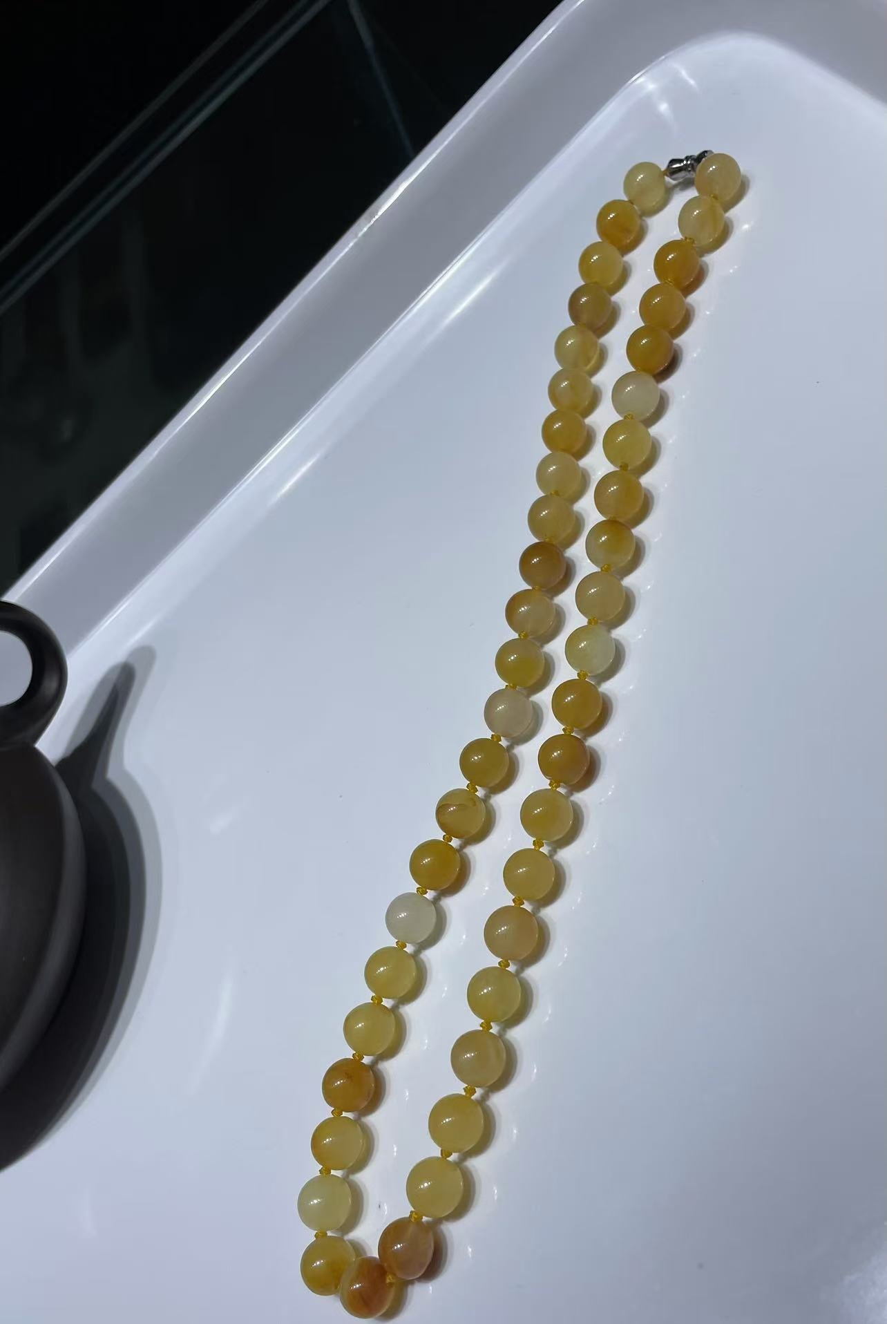 Golden yellow and icy translucent jade necklace