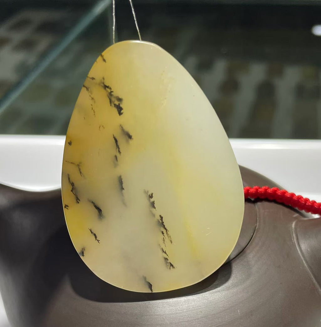 Yellow jade pendant (Ancient seabed gross)