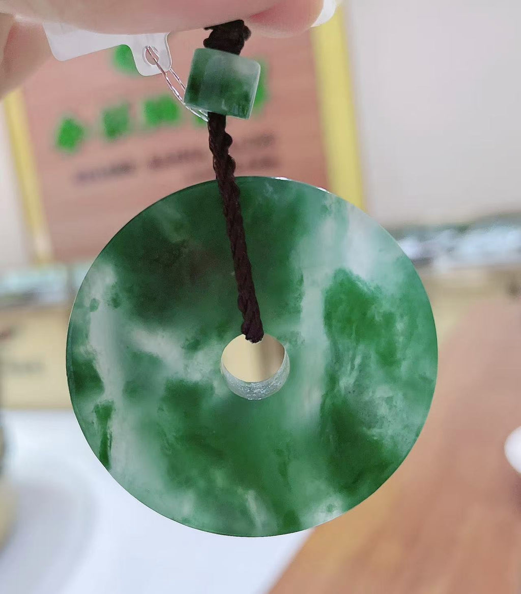 Natural green jade Peace Donut Pendant ( Collector's Scale Size )