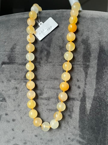 Golden yellow and icy translucent jade necklace