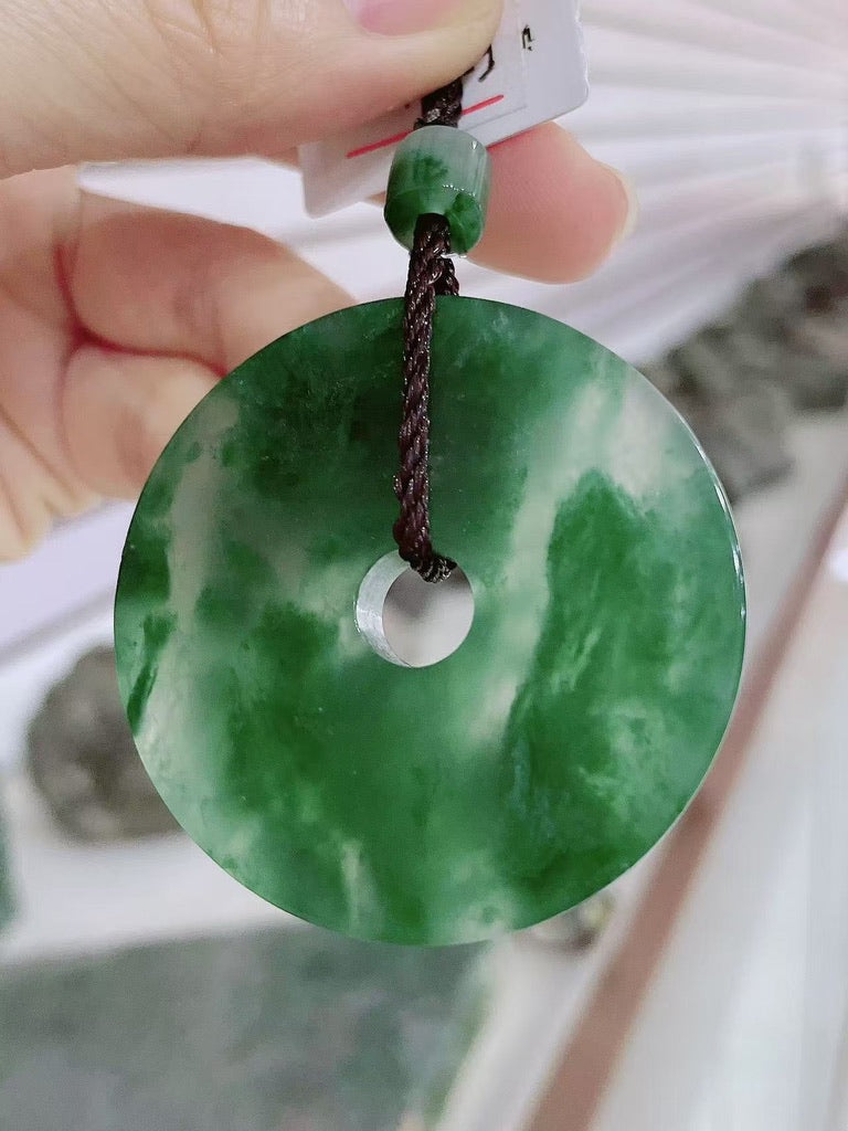 Natural green jade Peace Donut Pendant ( Collector's Scale Size )