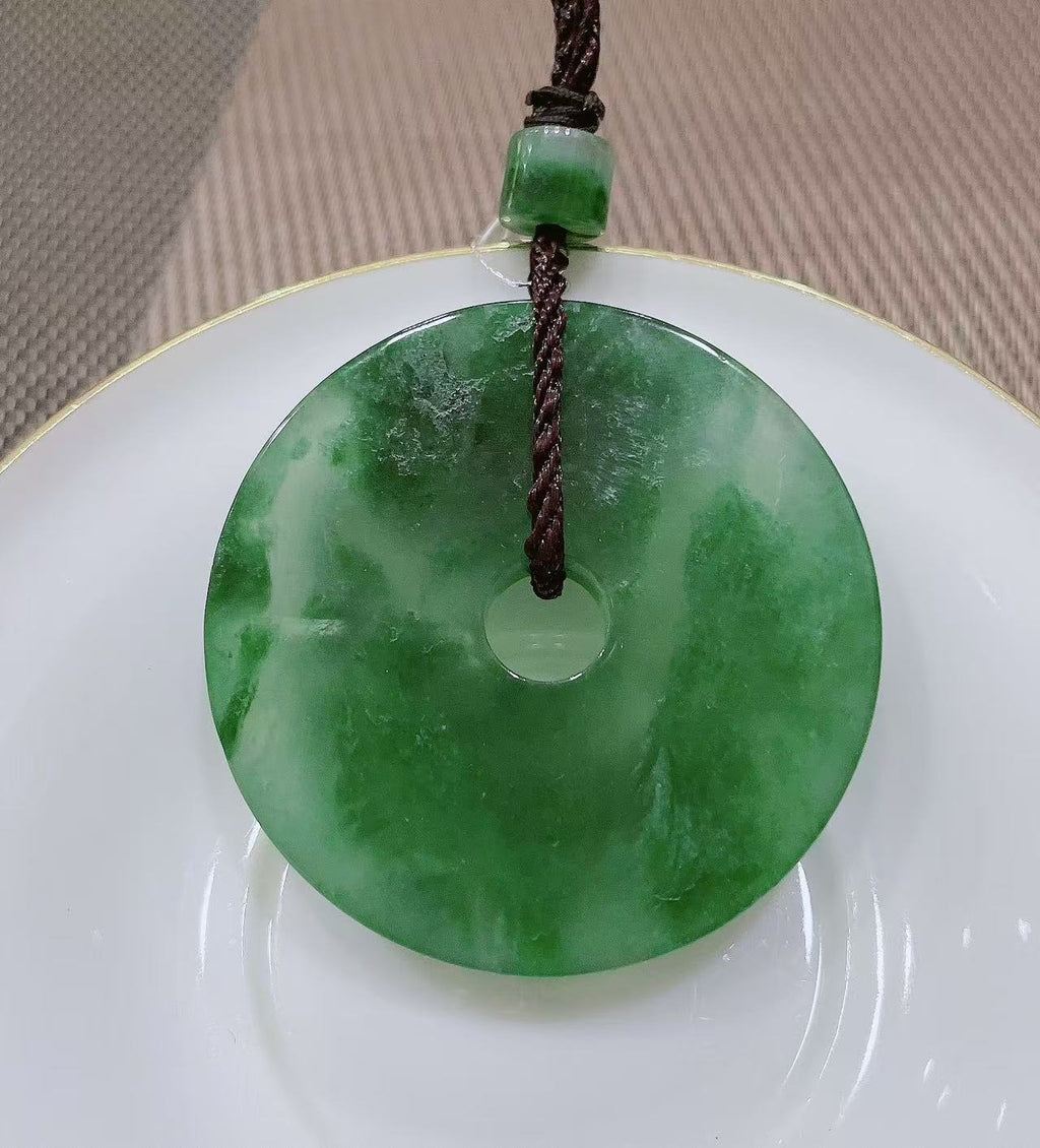 Natural green jade Peace Donut Pendant ( Collector's Scale Size )