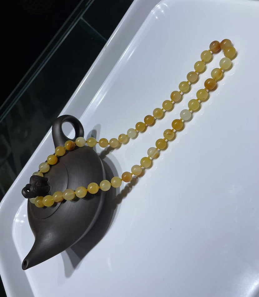 Golden yellow and icy translucent jade necklace
